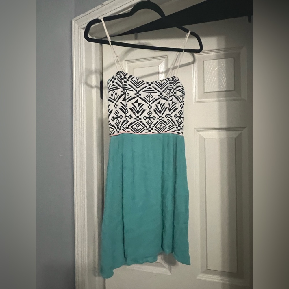 Turquoise dress with print on top- size medium